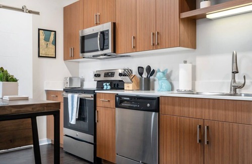 Traverse City Condo | *Tasteful TC Themed Trailside Condo*