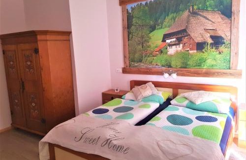 Mortschach House | Tattoo PENSION mit Restaurant und Tattoo-Studio