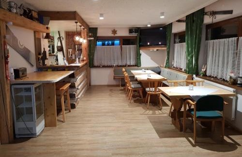 Mortschach House | Tattoo PENSION mit Restaurant und Tattoo-Studio