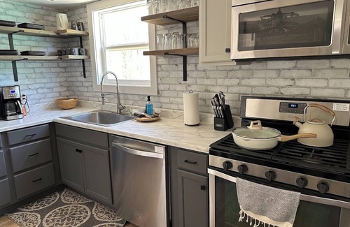 Grand Marais House | The 8's, farmhouse chic 4-bedroom w/garage access in Grand Marais, pet friendly