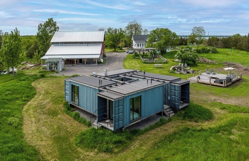 Gilbert Mills House | The Acres at High Shore - Shipping Container Suites & Stock Tank Pool