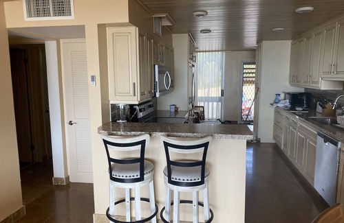 Estate Sion Farm Condo | THE BEST OF GENTLE WINDS. Luxurious unit overlooking the beach.