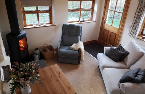 Rhosybol Cottage | THE BYRE, character holiday cottage, with open fire in Dulas