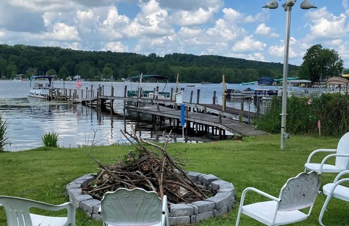Bloomfield Township Cottage | The Cardinal, a rustic lakefront cottage at The Pier at Canadohta Lake sleeps 5!