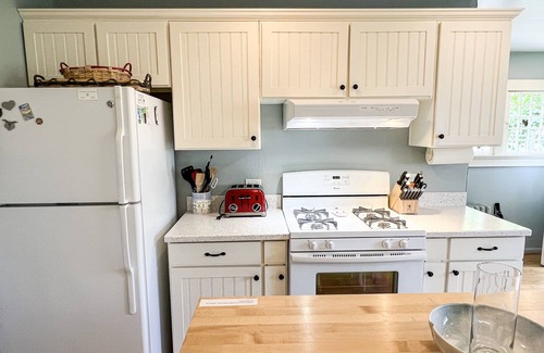 Wequetonsing Cottage | The Castle Cottage - 63 Beach - Weque - Private Lake Access