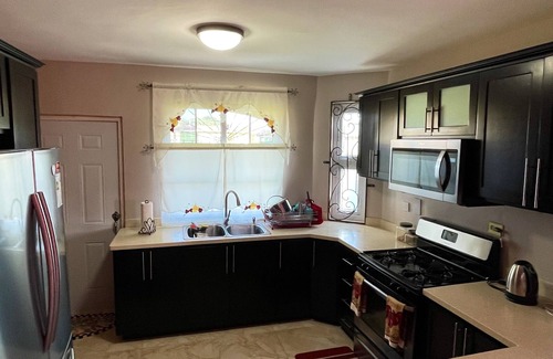Spanish Town House | "The Chandelier" Modern & Comfortable Home