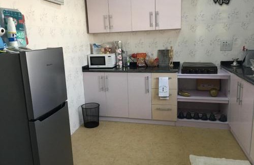 Yaba Apartment | The Diasporan 2 Bedroom Vacation Rental Home