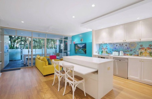 Bulimba Apartment | The Fish Bowl Vibrant Riverside Escape with Pool