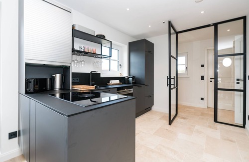 Rantum House | The great style mix of cool design pieces and Scandi style is responsible for this.