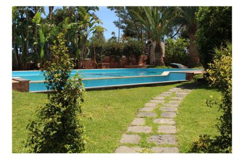 Fondachello Apartment | The Green Seaside