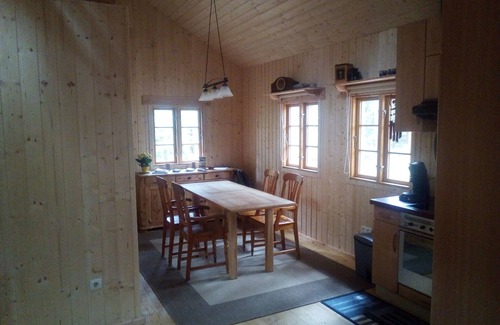 Suderburg House | The holiday home "Ortheide 69" is located in a forest settlement with large trees.