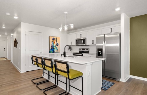 Elkhart House | The House Divided. New Home. Hot Tub. Game Room. Open Concept Living Spaces.