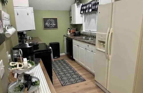 East Moline House | The Landing Zone.n Comfortable and cozy three bedroom with two car garage.