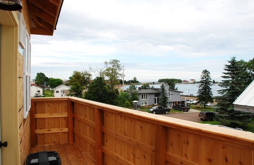 Grand Marais Apartment | The Lighthouse. unique lodging overlooking the harbor. Sauna special!