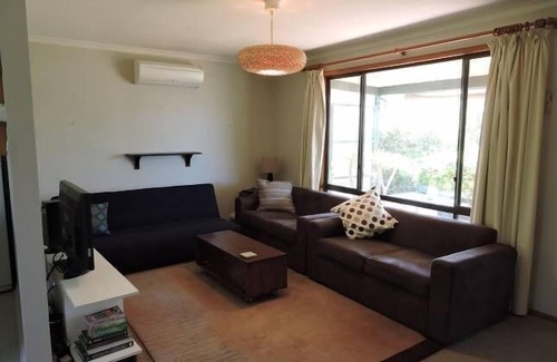 Tiddy Widdy Beach House | The "Love Shack" A Quiet Pet Friendly Home