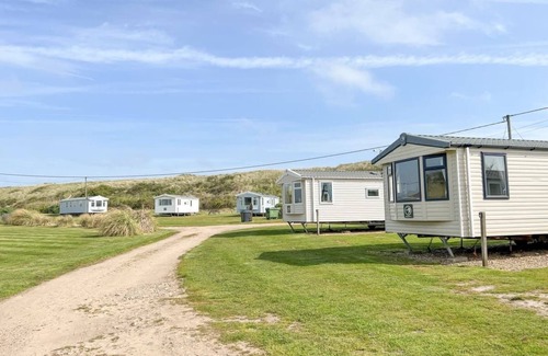 Irstead House | The new Delta is a two bed Caravan, with one double and one twin room.