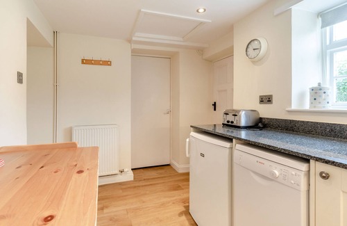 Cropton Cottage | THE OLD WATCHMAKER'S SHOP, pet friendly, with open fire in Cropton