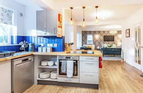 Sewerby Cottage | The open plan living area and interior design are a delight.