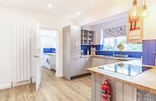 Sewerby Cottage | The open plan living area and interior design are a delight.