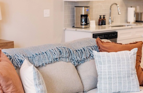 Oxford House | The Oxford Edit is a new 3BR/3.5BA townhome minutes from campus and the Square. Purple® mattresses, designer décor, a smart TV, Wi-Fi, and a pool nearby—perfect for game-day weekends, family visits, or stylish Southern escapes.
