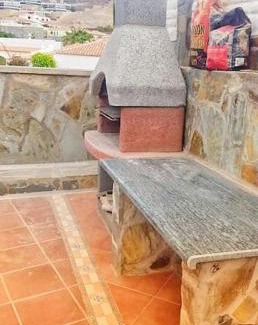 Mogan Apartment | The perfect place to relax Bedroom with hot tub, beautiful tropical garden area. Bbq and big open spaces through all the house.It is located in a quiet place, but still 5 min away from the touristic Puerto Rico and walking distance from the beach