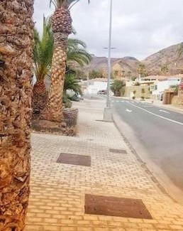 Mogan Apartment | The perfect place to relax Bedroom with hot tub, beautiful tropical garden area. Bbq and big open spaces through all the house.It is located in a quiet place, but still 5 min away from the touristic Puerto Rico and walking distance from the beach