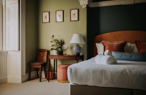 Grange-over-Sands Apartment | The Pheasant Lodge Spacious Cosy Georgian Apartment with Garden Views & Log Fire