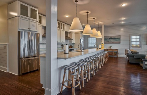 Ocean Isle Beach House | The Pineapple Beach Club, a Majestic Oceanfront Retreat, sleeps 36.