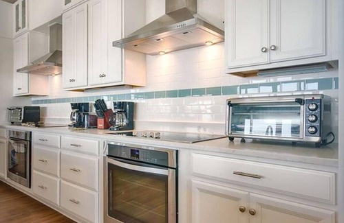 Ocean Isle Beach House | The Pineapple Beach Club, a Majestic Oceanfront Retreat, sleeps 36.