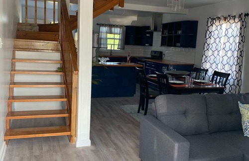 Dickenson Bay House | THE RADCLIFFE - Luxury townhome 7 mins walk to Beach, restaurants, bars.