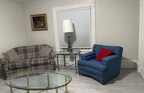 West Hill House | The Yellow-Shuttered House apt B