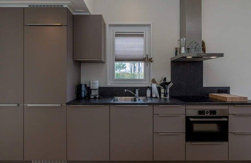 Burgh-Haamstede House | This attractive chalet is located in a beautiful location at the back of Schouwenduin, surrounded by