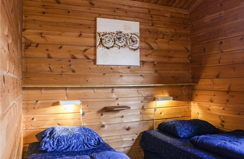Gramsbergen House | This cozy Finnish-style vacation home is located in a welcoming vacation park in Gramsbergen with ma