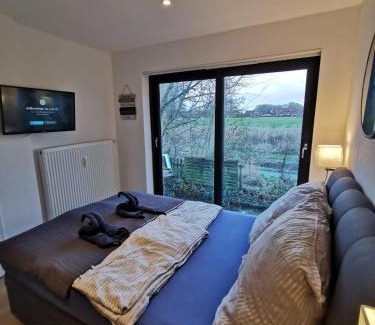 Altengroden Apartment | Tiny Home mit Panoramaterrasse - Ausblick ins Grüne inklusive