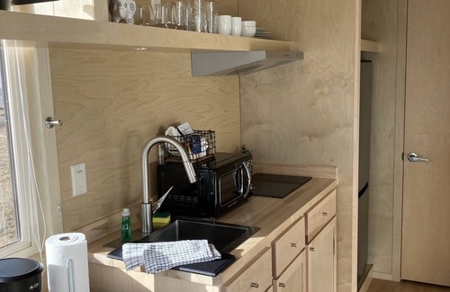 Grand Junction House | Tiny home with one queen bed on main floor and full size futon.