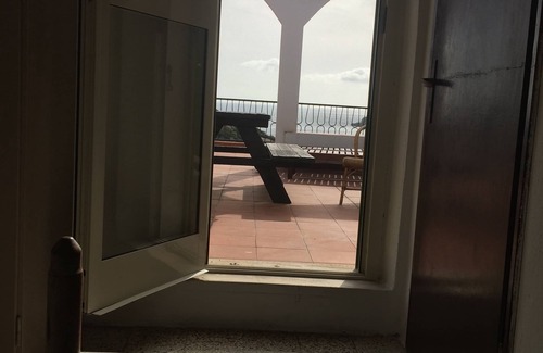 Arenella Villa | Top floor in a stunning villa on the sea with panoramic terrace and tennis court