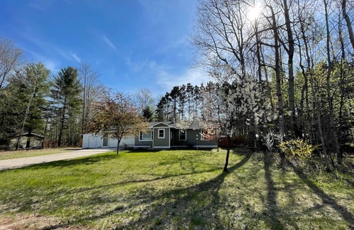 Rapid City House | Torch Lake Home: AC, arcades, game room, 3 min to Torch Lake! Bring your boat!
