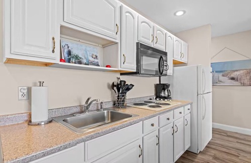 Kewadin Condo | πΆ Torch Lake Vista β A-Ga-Ming Golf & Lakeview Condo | Large Patio β 741/Unit 9B