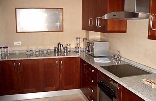 Quarteira House | Townhouse Overlooking Pool and Gardens and facing Pestana Vila Sol Hotel.
