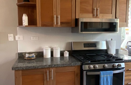 Llanos de Gurabo I Apartment | Tranquil Oasis Fully Stocked to make you feel like you are at home.