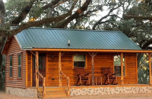 Cat Spring Cabin | Tranquility Cabin Surrounded By Live Oak Trees With A Fabulous Private Hot Tub!