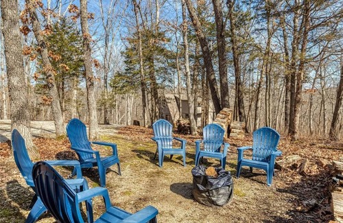 Wright City Ski Chalet | Treehouse Lodge by Sarah Bernard, a Woodland Retreat with Solo Stove Firepit