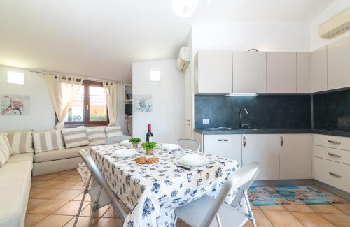 Baia Caddinas Apartment | Trilocale Baja Caddinas Dani - Happy Rentals