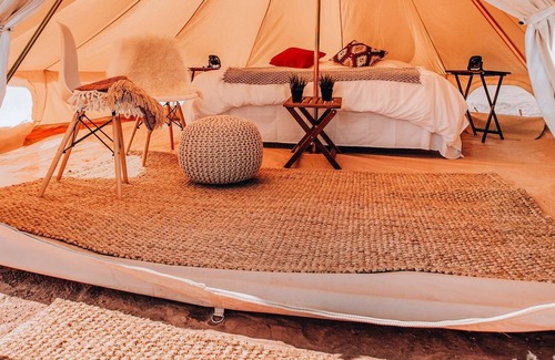 Valle House | Triple Tent w/ Shared Bathroom - Find us among the juniper trees and open sky.
