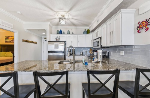 West Panama City Beach Condo | Tropic Winds by Book That Condo