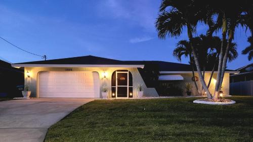 Cape Coral House | Tropical Breeze Canal Waterfront Home, Heated Pool