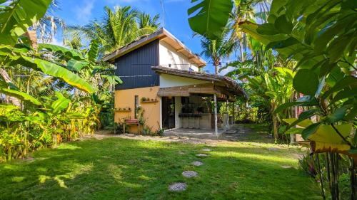 Catangnan Apartment | Tropical Haven with Dedicated Office Space in Siargao