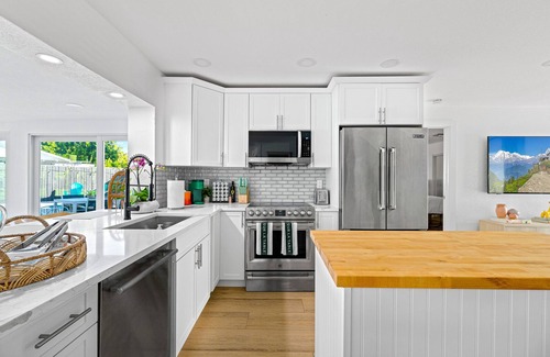 Parker Ridge House | Tropical Jungle Pool House in West Palm minutes from the beach, downtown, & PBI!