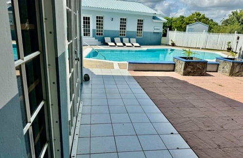 Ladyville House | Tropical Oasis w/Pool- sleeps 12!
