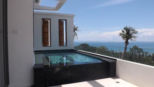 Maret Apartment | Tropical Sea View Residence